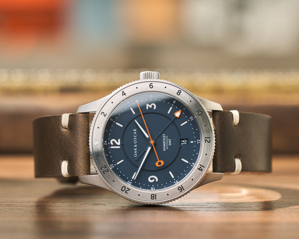 Dark olive green leather watch strap on Oak & Oscar navy dial Humboldt GMT