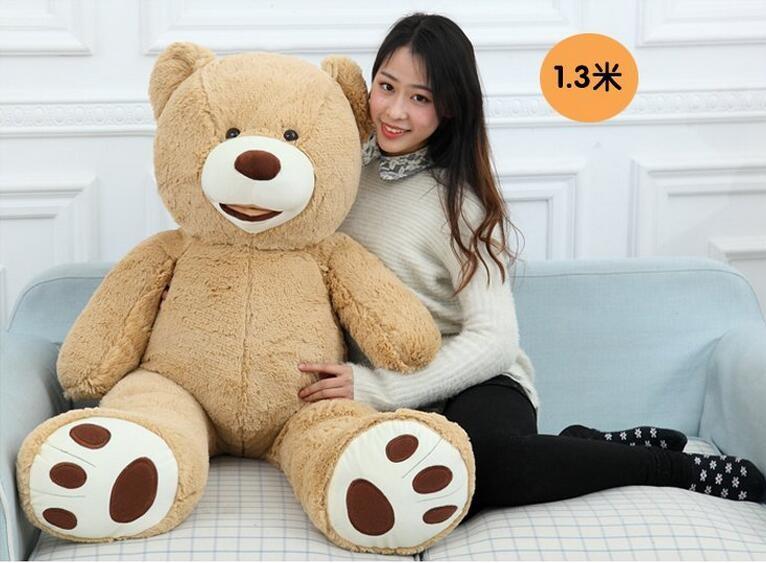 giant teddy bear with girl