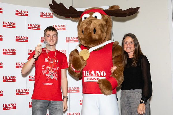 Reece Carver 1st boy’s winner with Louise Dudill, Communications and Engagement Manager and Moosey from Ikano Bank