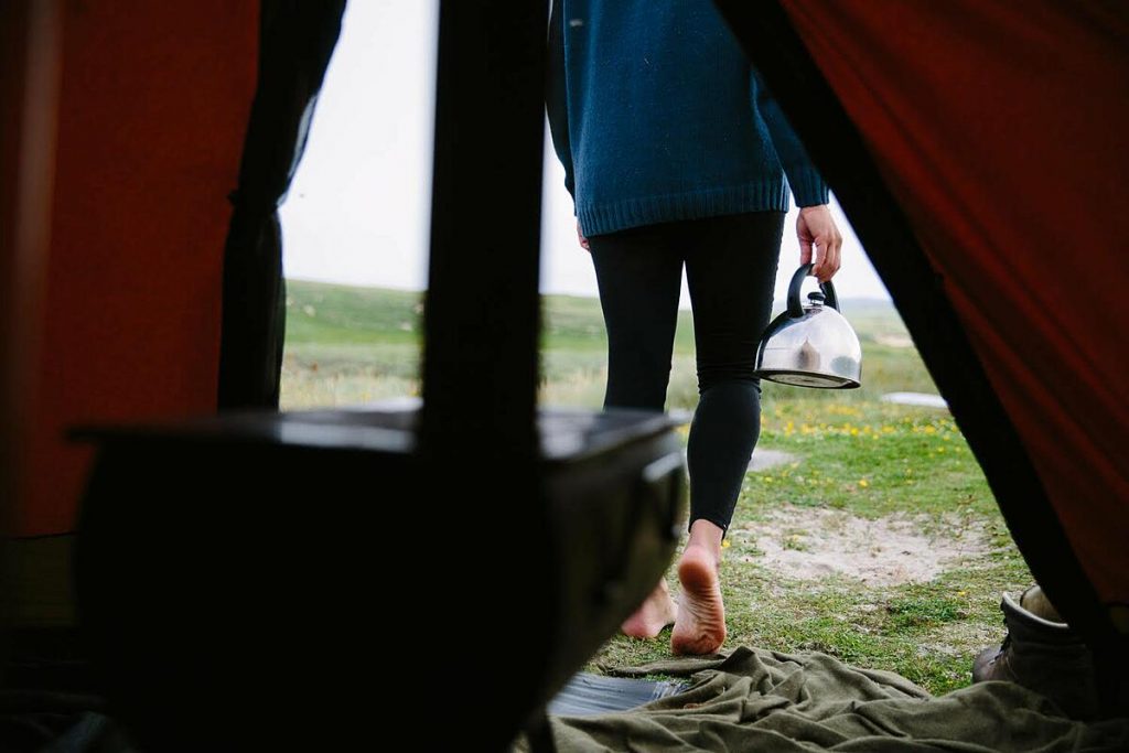 Frontier stove set up in a tipi