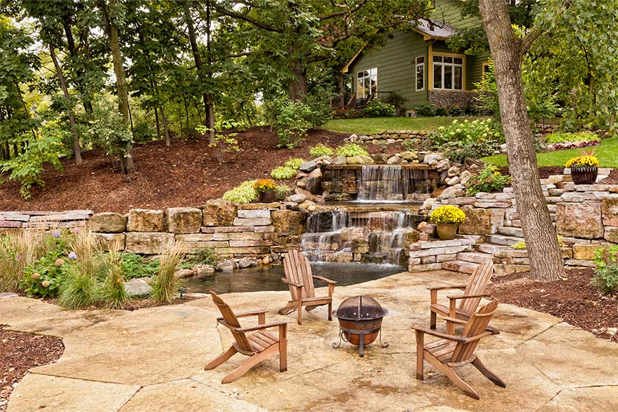 backyard landscape with waterfall