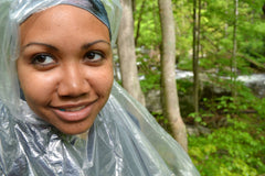 Steph of Green Steeze in poncho on hike