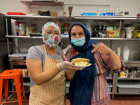 Maria, immigrant from mexico, and Nieda, refugee from Iraq, run the Havenly kitchen and show off their baklava ice cream sandwich