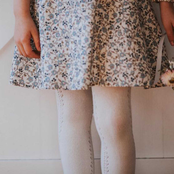 These gorgeous cotton blend tights with an all over pointelle knit