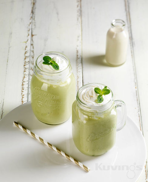 green tea smoothies on white surface