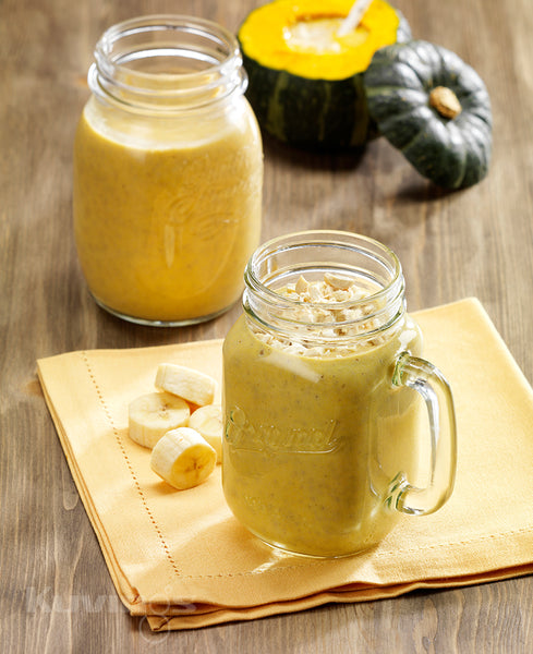 sweet pumpkin smoothie in a mason jar with handle