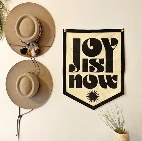 "Joy Is Now" banner, by Daren Thomas Magee