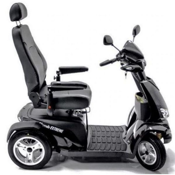 Image of a black Merits Silverado Extreme 4-wheel all-terrain mobility scooter, viewed from the side.