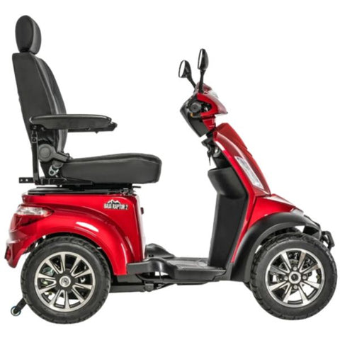 A candy apple red Pride Baja Raptor 24-wheel mobility scooter, shown in a side view.