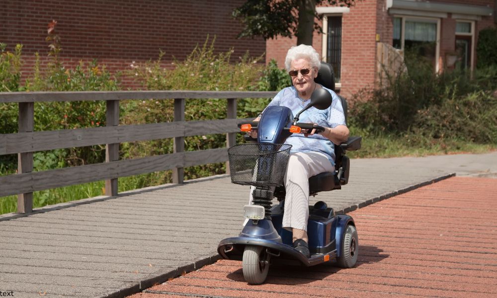 Old Lady riding a mobility scooter