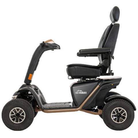 A heavy-duty scooter in desert sand color, viewed from the right side.