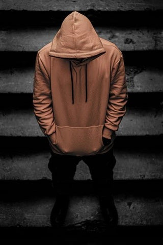 A man wearing a streetwear hoodie