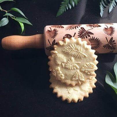 embossed rolling pin and cookies