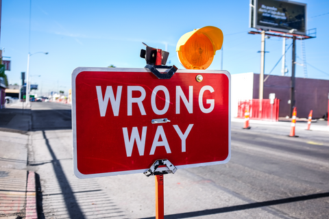 Road sign that says "Wrong Way"