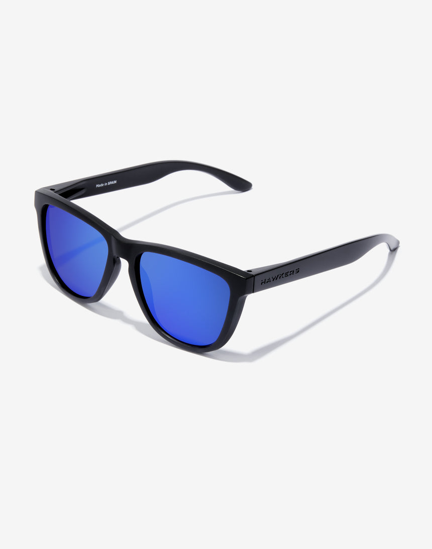 dolor fusión Ascensor ▷ Gafas de Sol Hawkers One negras polarizadas azul espejo unisex – Joyeria  Zeller