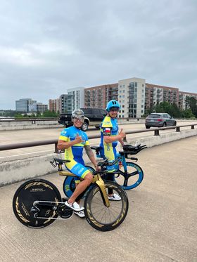 A team of cyclists wearing matching Cycle-Run cycling kits, showcasing the importance of a unified team look and identity.