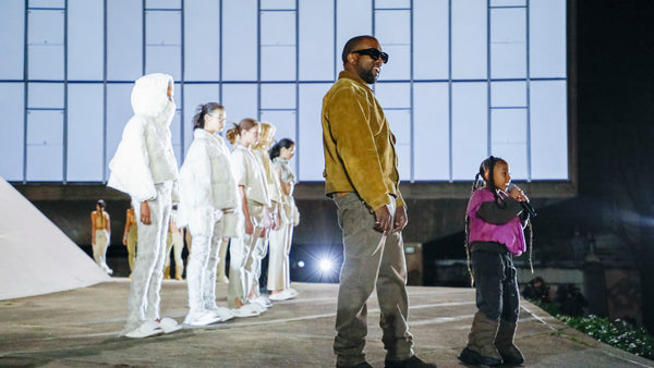 Kanye West and daughter North West appear on stage at YEEZY season 8 fashion show