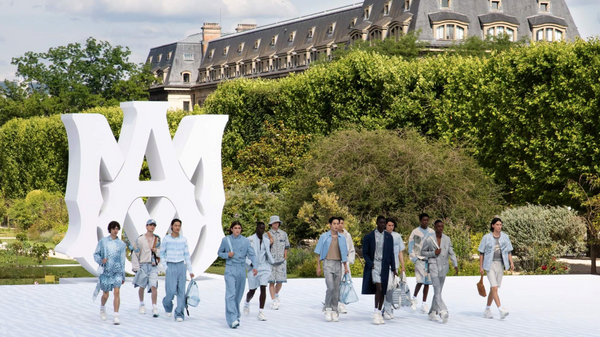 Models walk the catwalk at the Jardin des Plantes for AMIRI's SS23 Paris Fashion Week presentation