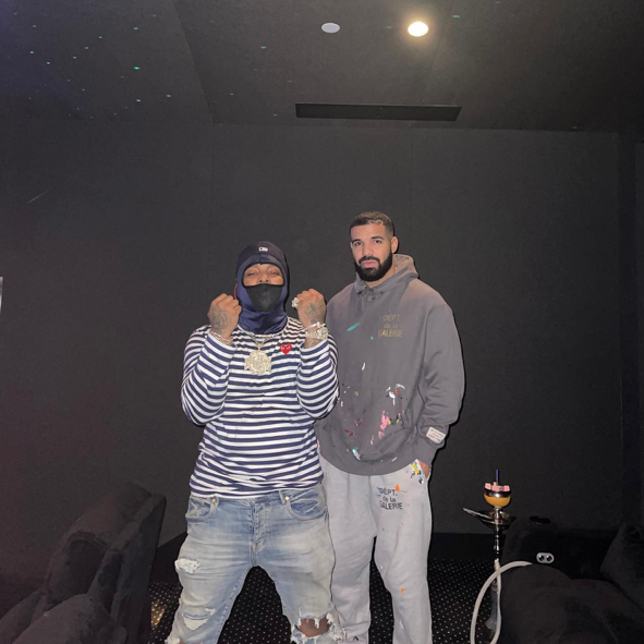 Drake wears a Gallery Dept. hoodie and sweatpants