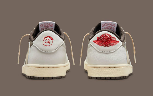 Cactus Jack and Air Jordan logos decorate the heels of Travis Scott x Air Jordan's 1 Low Reverse Mocha sneaker