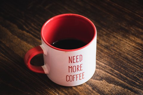 Coffee mug that read need more coffee