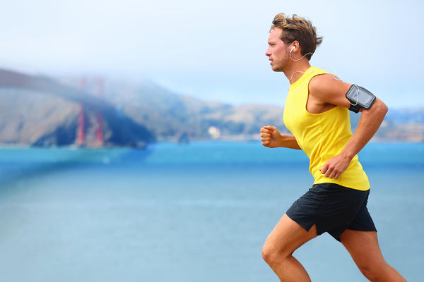 Men Runner Running With Compression Socks Near Water