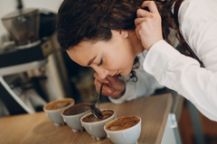 woman coffee cupping