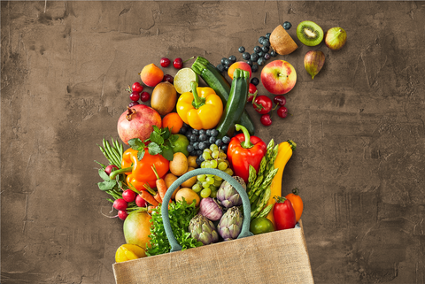 Shopping Bag Spilling Out Fruit and Vegetables 