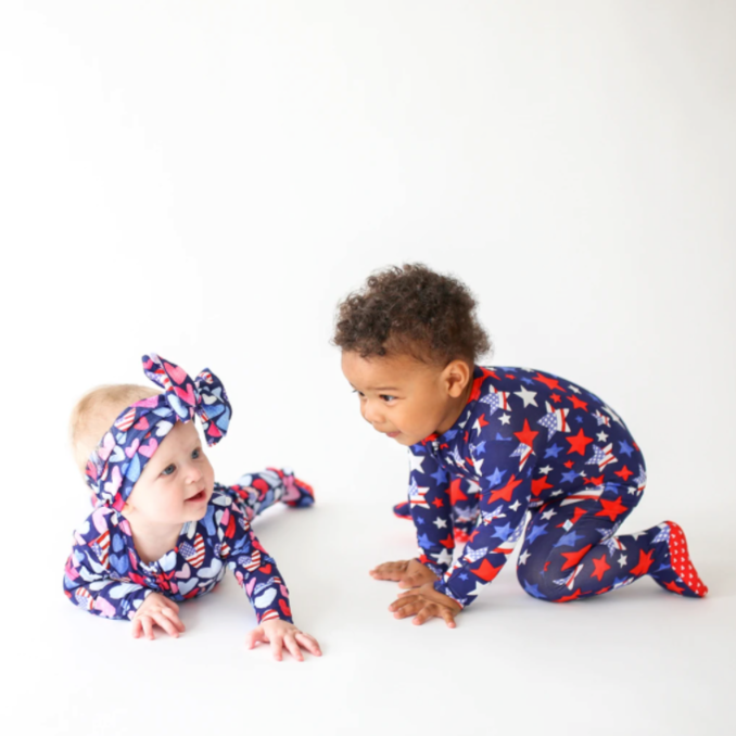 two kids in patriotic one piece baby clothes