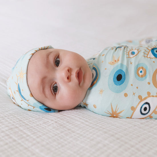baby in swaddle
