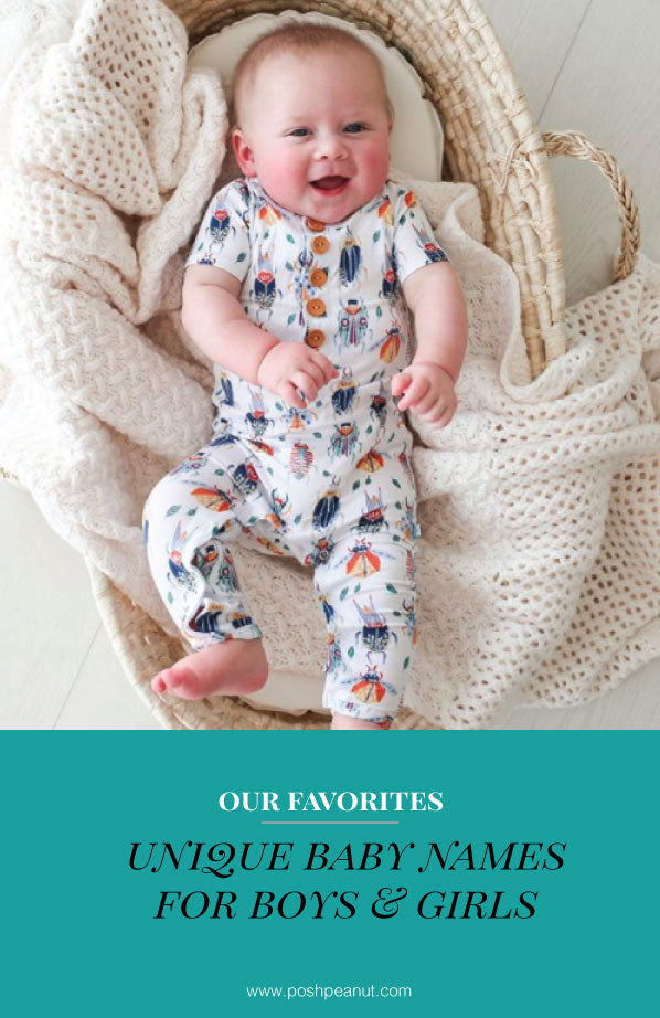 baby boy in bug pattern onesie