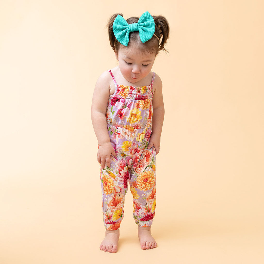 Image of Nala Sleeveless Smocked Jumpsuit