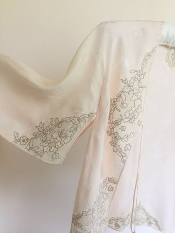 Peach 1940s jacquard woven silk bed jacket with drawn lace work and silk georgette and tulle embellishment appliqué.