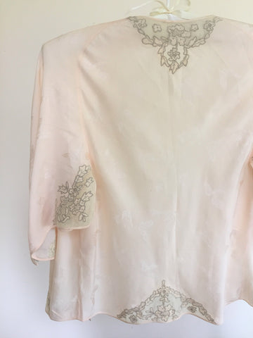 Peach 1940s jacquard woven silk bed jacket with drawn lace work and silk georgette and tulle embellishment appliqué.