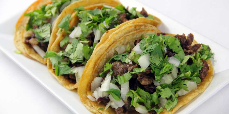 Cilantro leaves on steak tacos