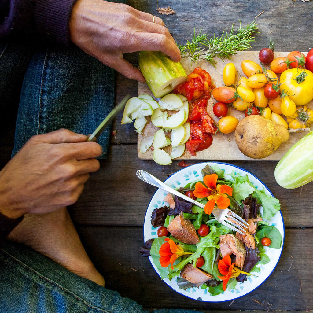 Fruits and vegetables fresh from the backyard, paired with Provisions Wild Sockeye Salmon for a quick lunch. Thimbleberry Pond, CA.