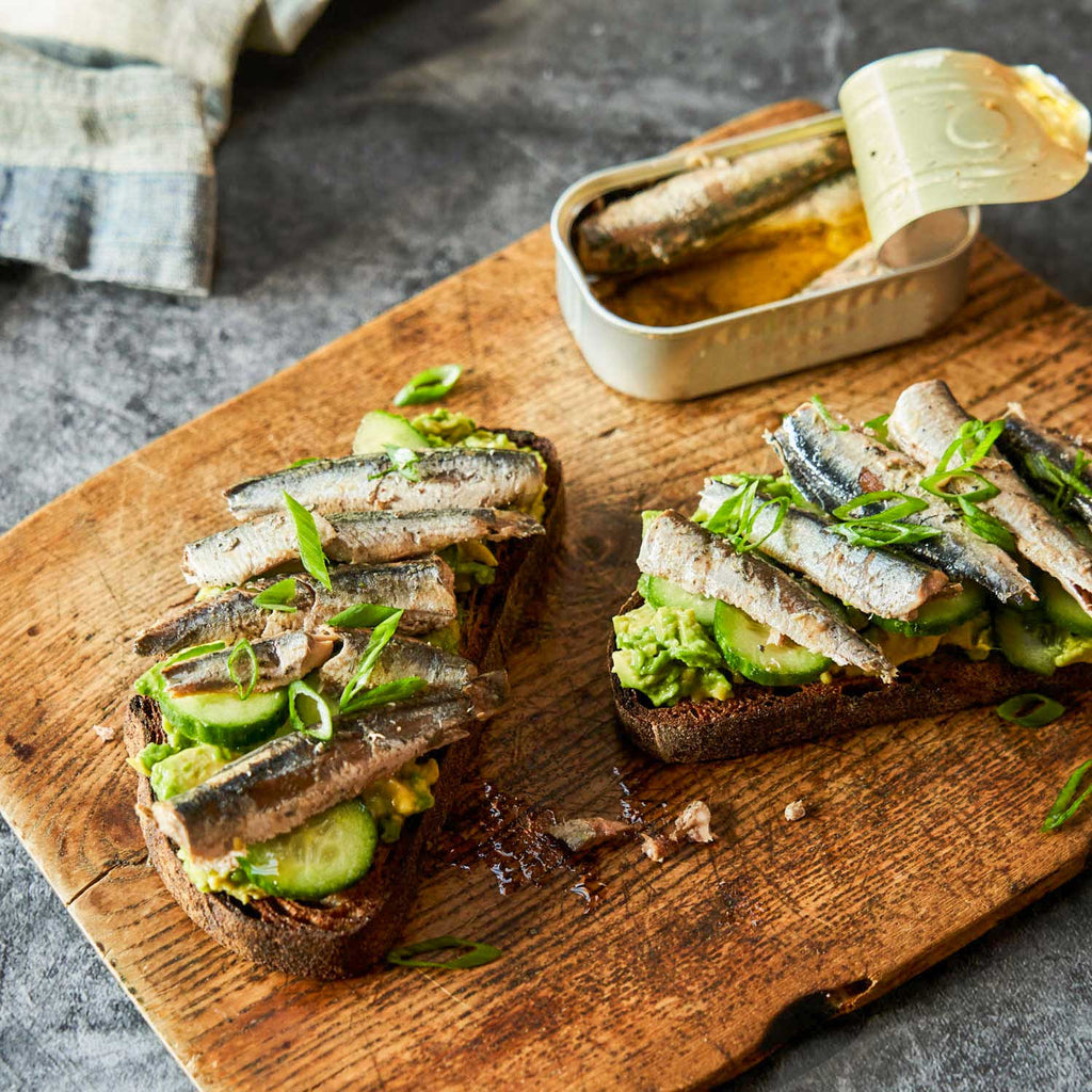 Whole-wheat toasts topped with avocado mash, cucumbers, Spanish White Anchovies and green onions. Simple and so good. Photo by Thomas J. Story