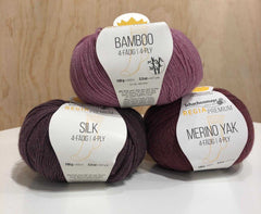 3 Balls of Regia Premium yarns in shades on plum