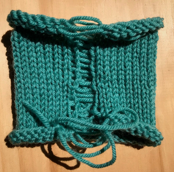 Teal knitted swatch in the round