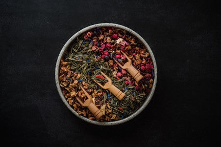 bowl of loose herbal leaves to be used as tea