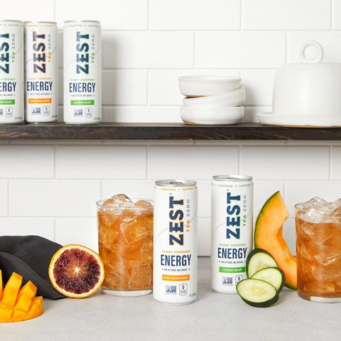 zest tea cans on a white kitchen countertop