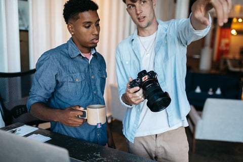 two men at work while drinking hot energy tea