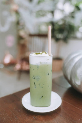 iced matcha latte in tall glass