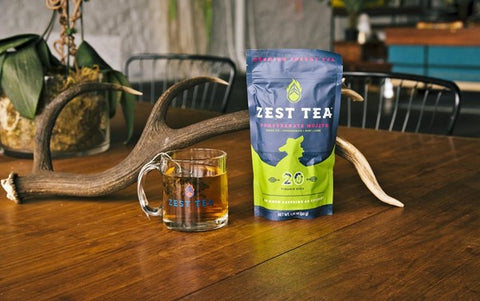 zest energy tea pouch and brewed green tea
