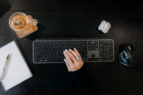 a cup of tea at a work desk