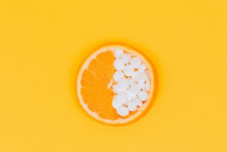 orange with white pills
