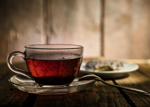 black tea in glass teacup