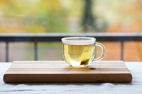 herbal tea in a glass teacup