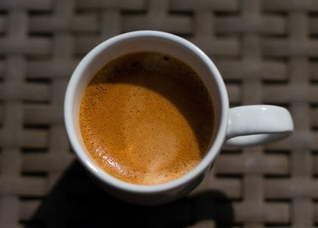 mug of brown coffee