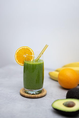 green smoothie with orange slices